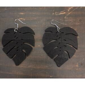 Black wooden laser-cut dangle earrings in the shape of Monstera leaves NWOT